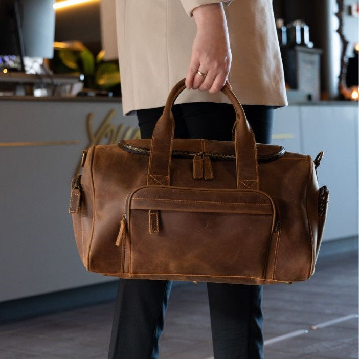 Skinnbag i ekte brunt skinn til Dame og Herre