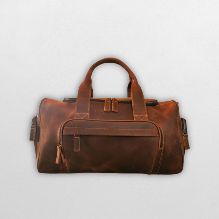 Skinnbag i ekte brunt skinn til Dame og Herre