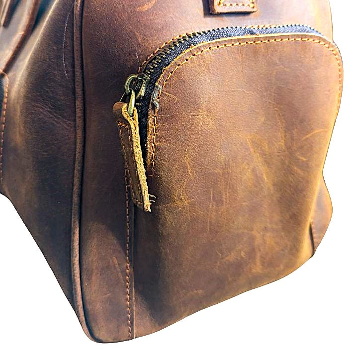 Skinnbag i ekte brunt skinn til Dame og Herre